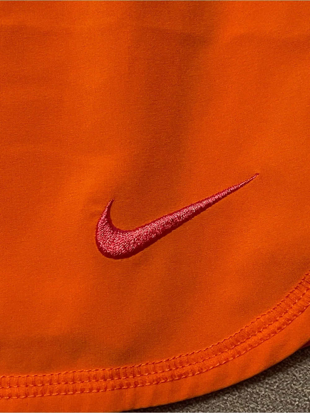 Nike Dri-FIT Women's Bright Orange Running Athletic Shorts with Pink Swoosh